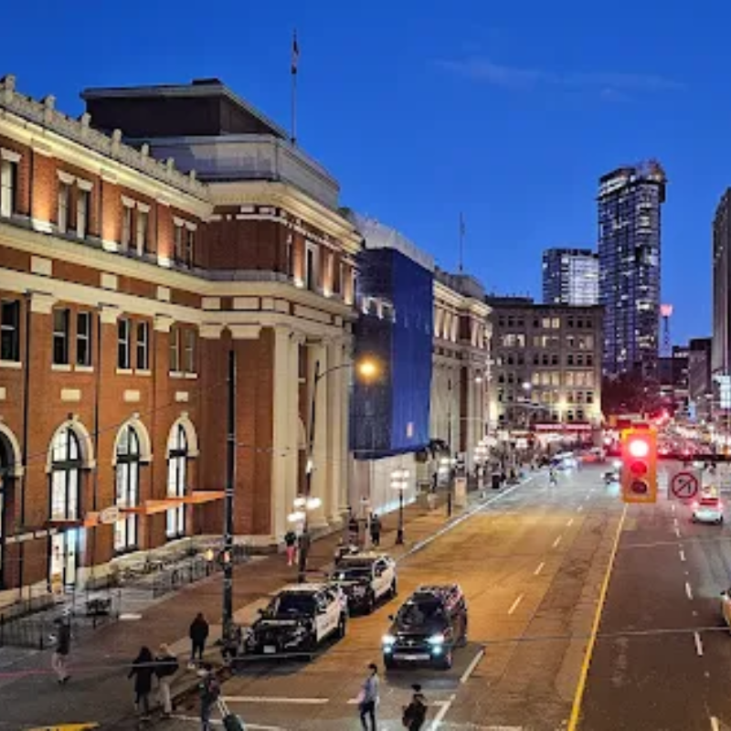 Night view of Canada Place Transit Station. Closet station to Sinclair Centre, Work Permit Canada Vancouver office.